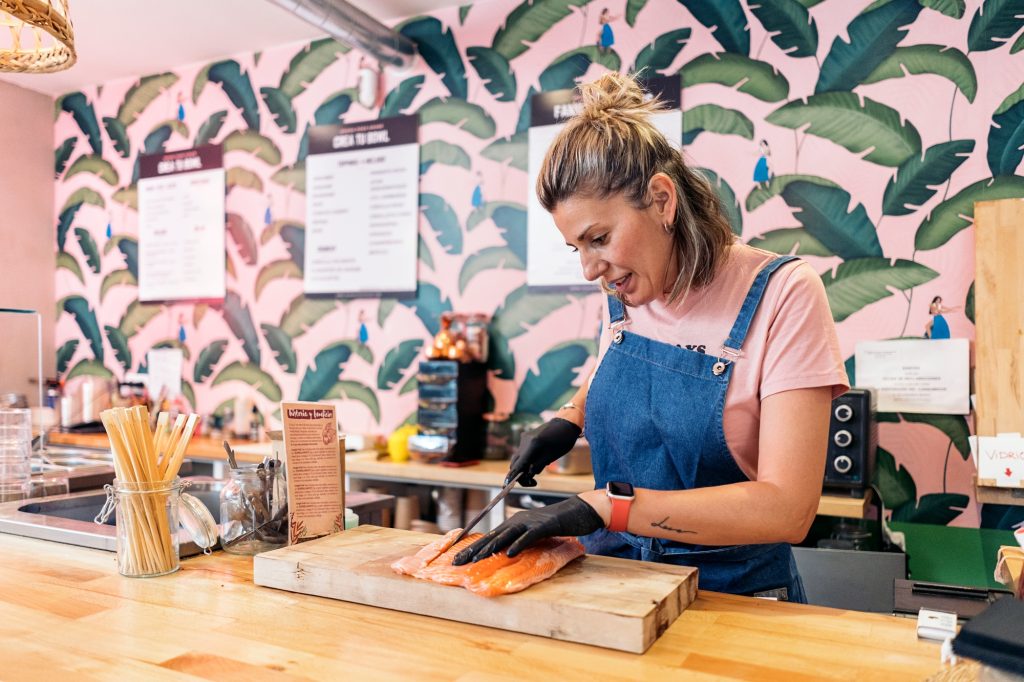 Restaurant Worker Cutting Salmon