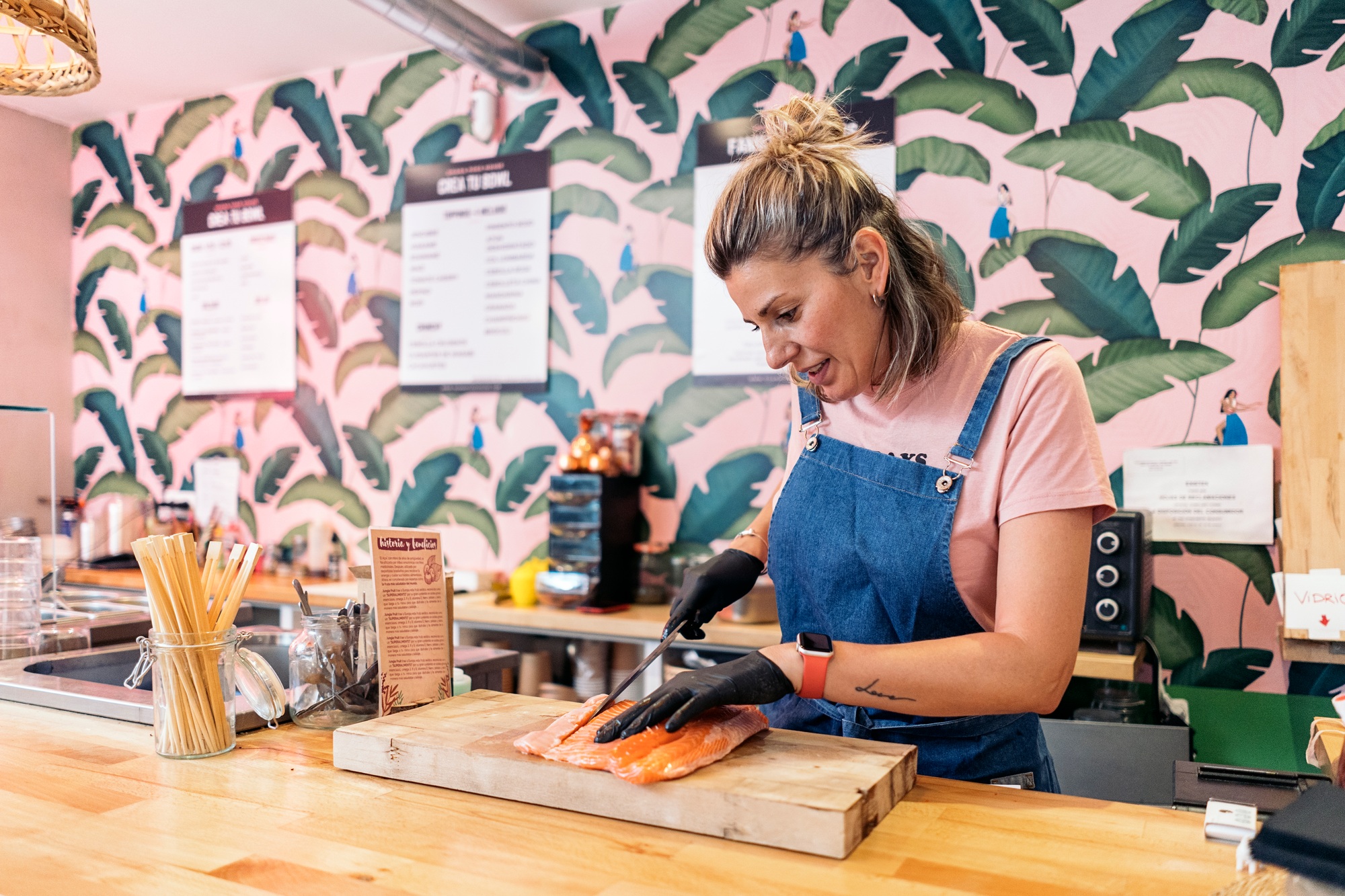 Restaurant Worker Cutting Salmon